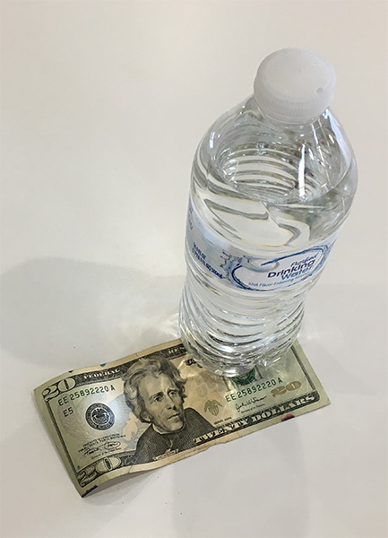 Bottle of water on $20 bill