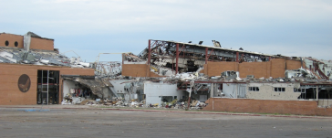 Image of a heavily damaged school building.